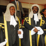 Speaker-Kadaga-Oulanyah-and-the-clerks-201b6e37